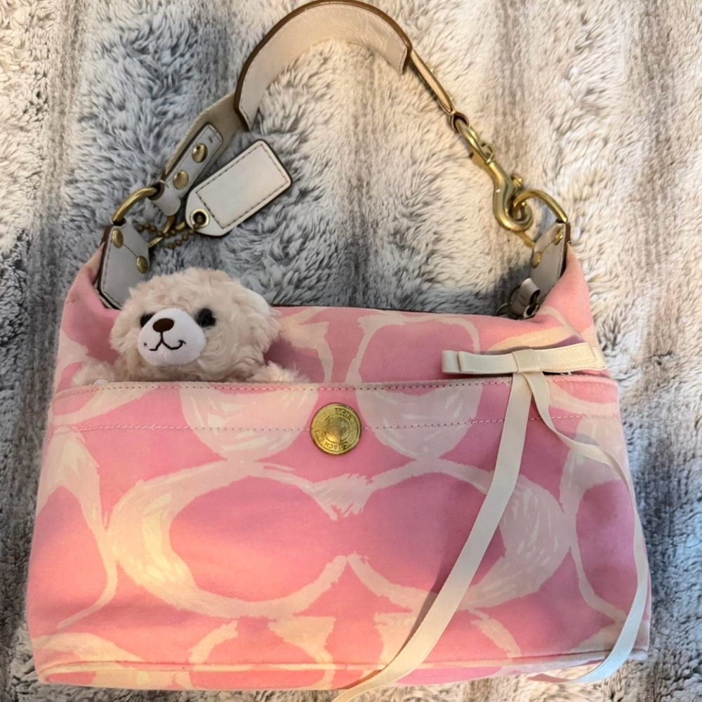 Pink and white vintage coach shoulder bag.